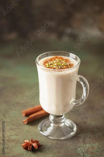 Turkish traditional hot drink salep on green background photo