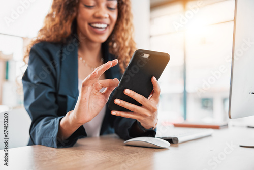 Phone, hand and communication with a business black woman laughing at a meme in her office at work. Contact, social media and mobile with a female employee browsing the internet for a joke or humor