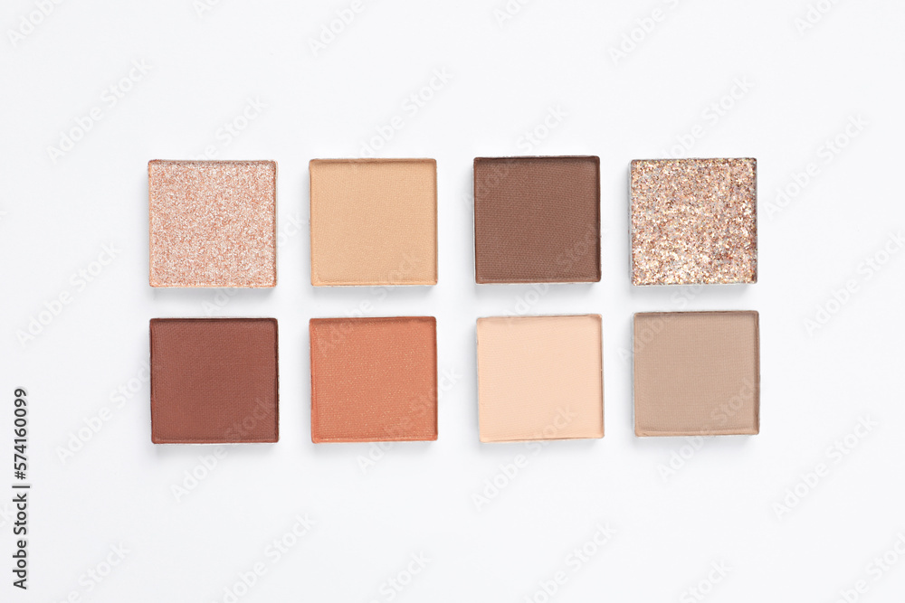 Beautiful eye shadow refill pans on white background, flat lay Beautiful eye shadow refill pans on white background, flat lay