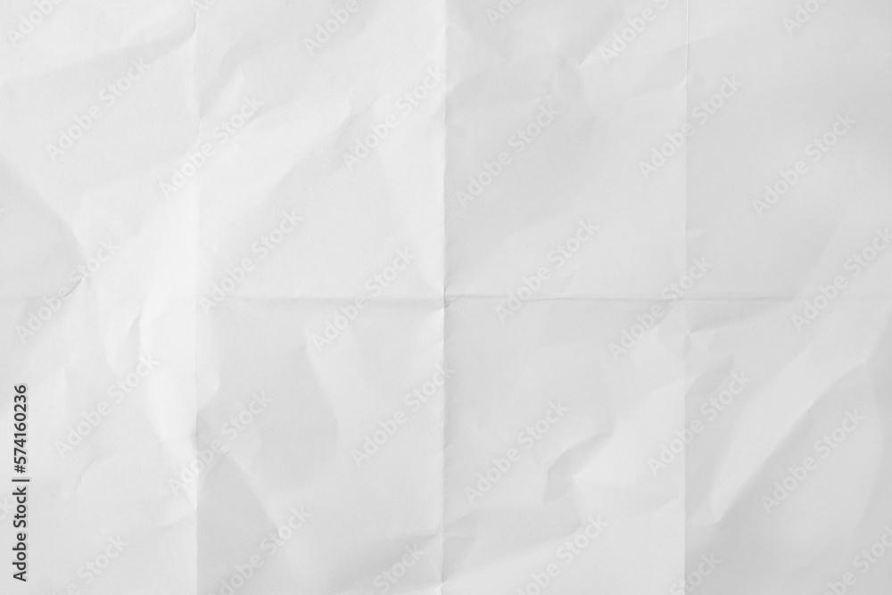 Sheet of folded white paper as background, top view Sheet of folded white paper as background, top view