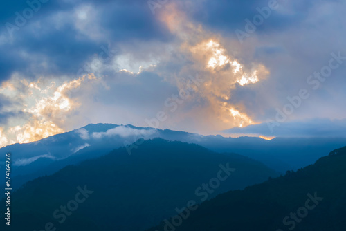 Dramatic clouds over Hiamalayan mountains after sun set, shot at Okhrey, Sikkim, India. Spectacular cloud formations making a beautiful sceneary. Sikkim,travel destination for tourists from worldwide.