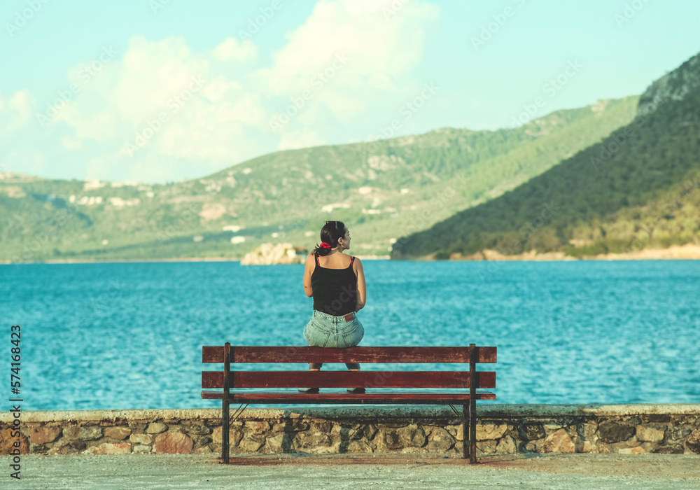 person sitting on a bench
