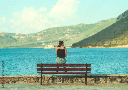 person sitting on a bench