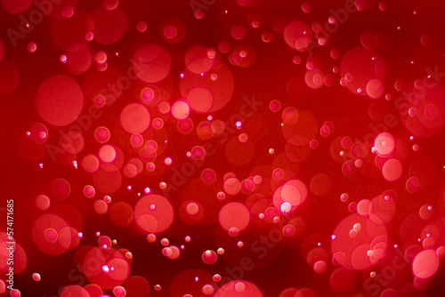 Abstract red bokeh background with soft blur bokeh light effect, background bokeh