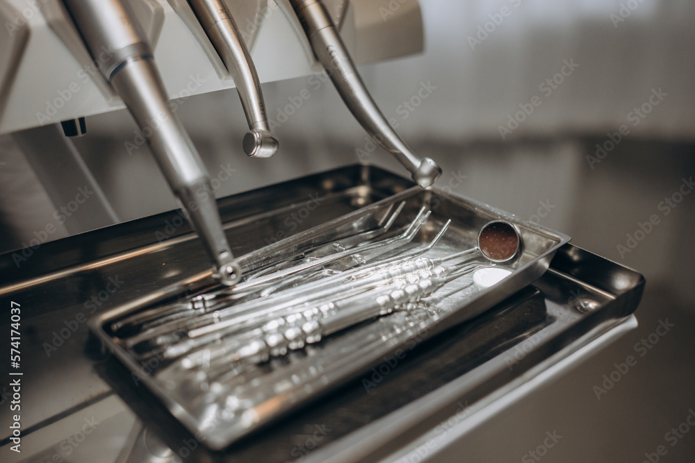 Close-up of a dentist's chair, with all the instruments ready to do a check-up. dental health. Close-up of a dentist's chair, with all the instruments ready to do a check-up. dental health.