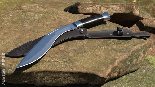 Fotografía Kukri knife and leather scabbard lying on a stone. 3D rendering