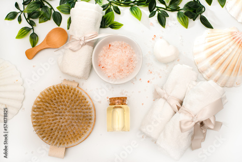 Spa concept with natural organic cosmetics, oil and bathroom accessories. Skincare concept on white background