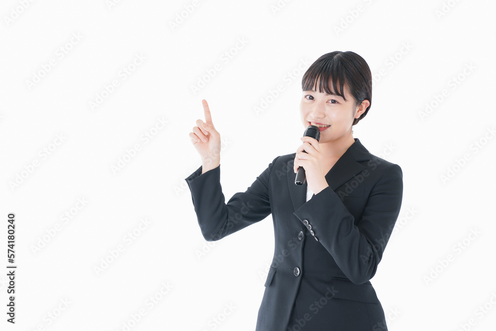 ポイントを示すスーツを着たビジネスウーマン