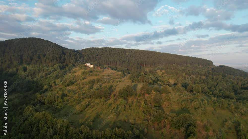 Forest Summit, spring forests, green mountain terrain, drone view of mountain ranges, majestic nature view from the air Forest Summit, spring forests, green mountain terrain, drone view of mountain ranges, majestic nature view from the air