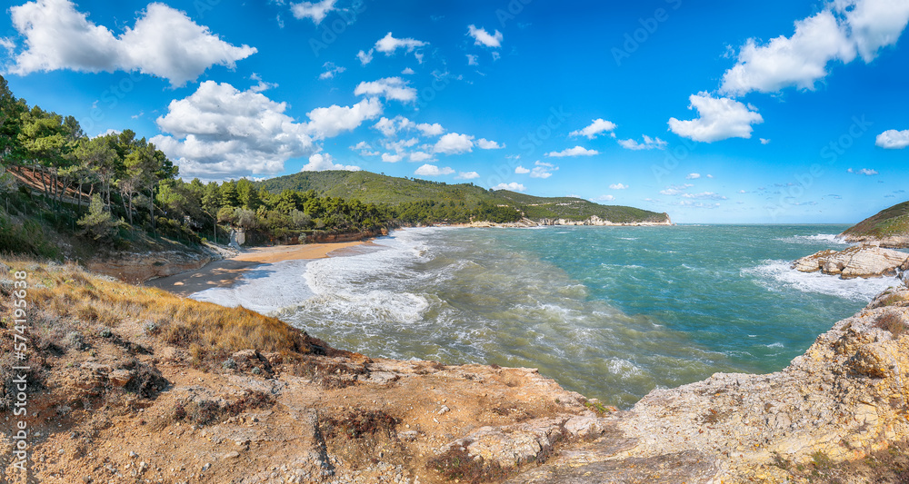 Above the cliffs at the coastline of Vieste. Summer rocky sea coast Baia Di Campi Vieste on the Gargano peninsula
