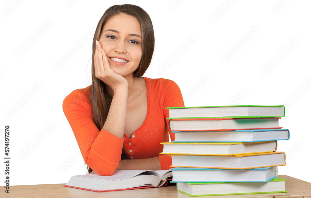 Beautiful young female student with stack of homework Beautiful young female student with stack of homework