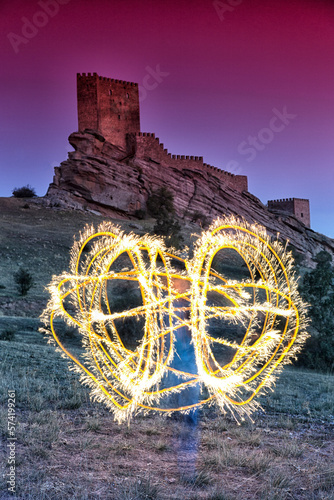 Light painting in front of Castle of Zafra, Campillo de Duenas, Guadalajara, Castilla La Mancha, Spain photo