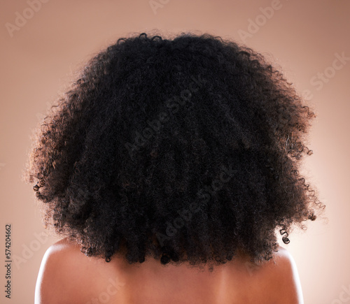 Foto Natural hair, black woman with afro and beauty, haircare and cosmetics with back on studio background