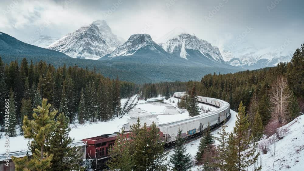 Viewpoint of Morants Curve with iconic red cargo train passing through ...