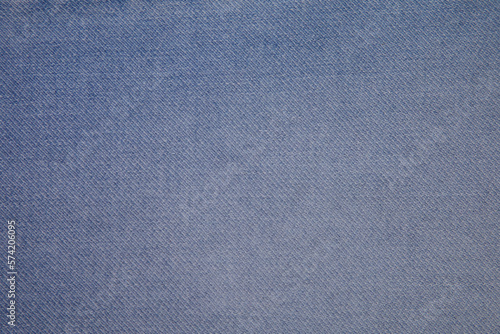 Sky blue jeans fabric background texture. Sky blue jeans fabric cloth textile material.