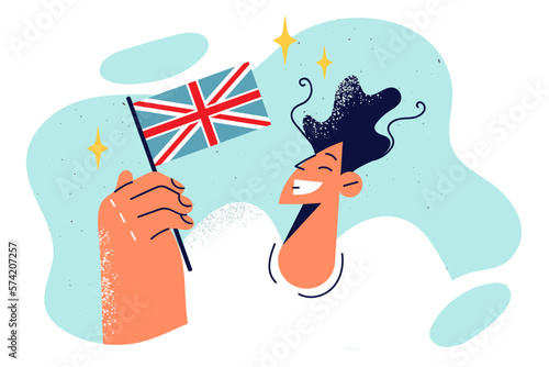 Man with United Kingdom flag smiles after emigrating to London or getting education in England