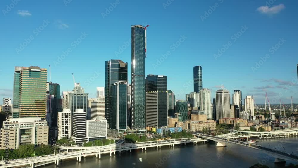 Aerial drone shot of Brisbane's cityscape from West End, as the camera gracefully flies backwards, revealing a large apartment building in the heart of West End. Aerial drone shot of Brisbane's cityscape from West End, as the camera gracefully flies backwards, revealing a large apartment building in the heart of West End.