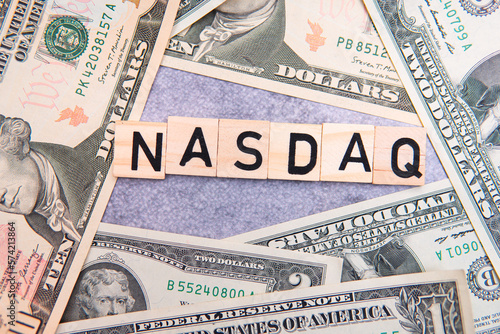 Nasdaq inscription next to US dollars. The Nasdaq is an American stock market index photo