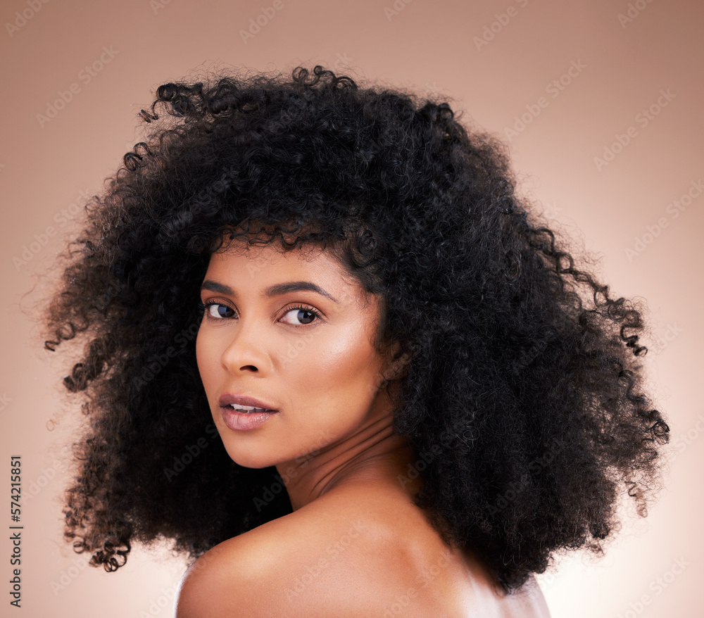 Hair, face and beauty with black woman in portrait, skin and natural cosmetics with glow on studio background. Female, cosmetic treatment with curly hairstyle, texture and growth with facial skincare Hair, face and beauty with black woman in portrait, skin and natural cosmetics with glow on studio background. Female, cosmetic treatment with curly hairstyle, texture and growth with facial skincare
