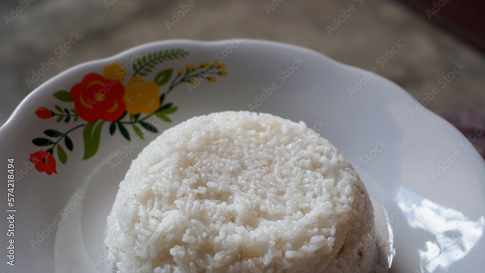Cooked rice. Close up of white rice on a plate.