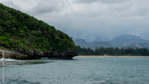 Blue sea and tropical island. holiday and vacation concept. Beautiful view of beach landscape at eky momong beach in Banda Aceh, Indonesia.