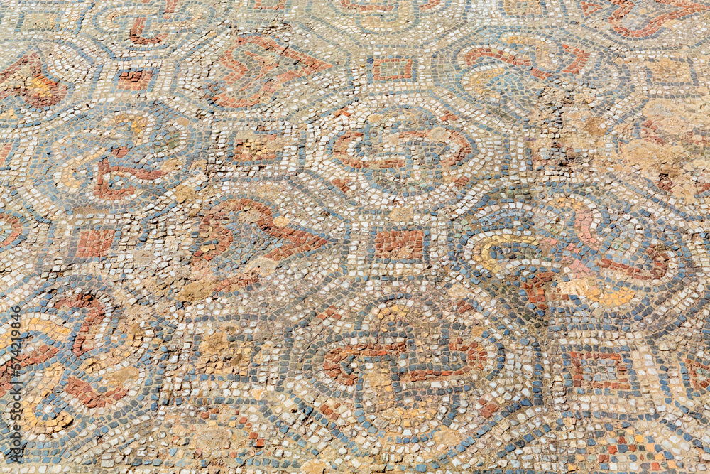 Archaeological remains with decorative tile floors and frescoes paintings in a hillside house on the slopes of the ancient city ruins of Ephesus, Turkey near Selcuk. Archaeological remains with decorative tile floors and frescoes paintings in a hillside house on the slopes of the ancient city ruins of Ephesus, Turkey near Selcuk.