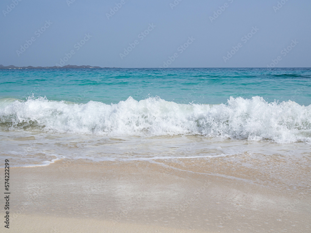beach with white sand and waves