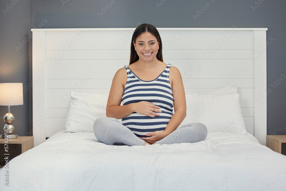 Excited, motherhood and portrait of a pregnant woman on a bed for peace, rest and touching stomach. Smile, baby and girl feeling her belly during a pregnancy, maternity leave and relax in the bedroom Excited, motherhood and portrait of a pregnant woman on a bed for peace, rest and touching stomach. Smile, baby and girl feeling her belly during a pregnancy, maternity leave and relax in the bedroom