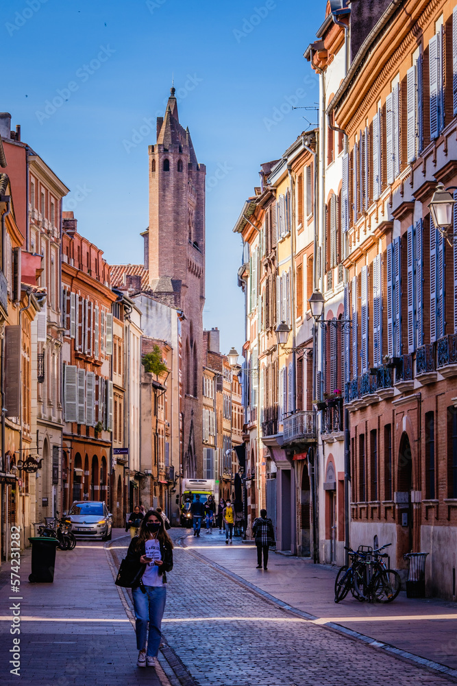 View on the Rue du Taur and Notre Dame du Taur church and typical facades of Toulouse, in the south of France (Haute Garonne)