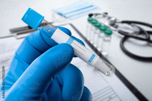 Medical hand blood or medical test tubes in lab