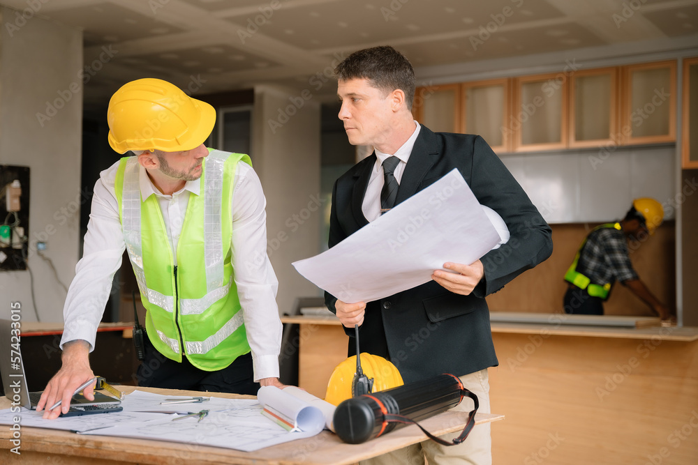 Group architect team on construction site inspection documents and business workflow in the morning. Group architect team on construction site inspection documents and business workflow in the morning.