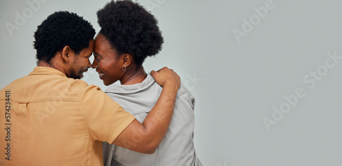 Mockup, wall background or black couple love bonding, hugging or enjoying quality time together at home. Back view, forehead or African man with a happy woman hug while relaxing in apartment or house