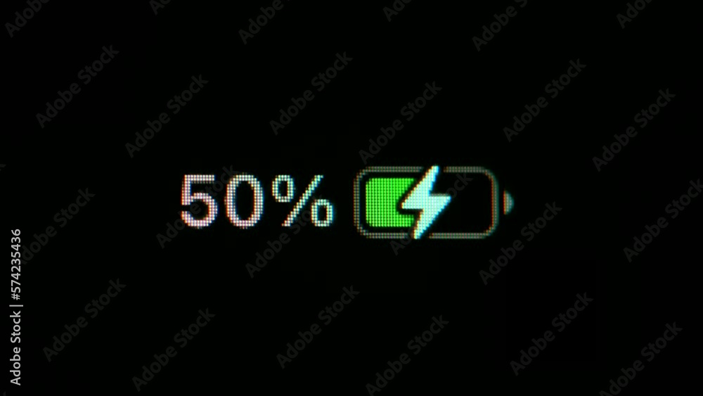 Time Lapse: Your smartphone battery charges from zero to 100%. Close the macro shot of the battery level indicator on your smartphone that is charging over time. Time Lapse: Your smartphone battery charges from zero to 100%. Close the macro shot of the battery level indicator on your smartphone that is charging over time.