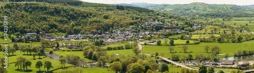 Panoramic aeriial landscape view of farms and hills above the town of Corwen North Wales photo