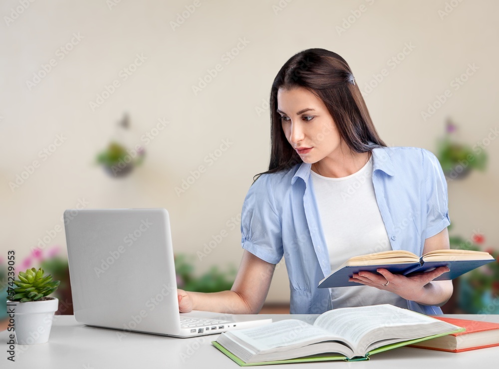 Young student woman working with computer Young student woman working with computer