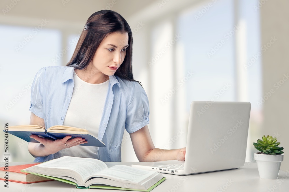 Young student woman working with computer Young student woman working with computer