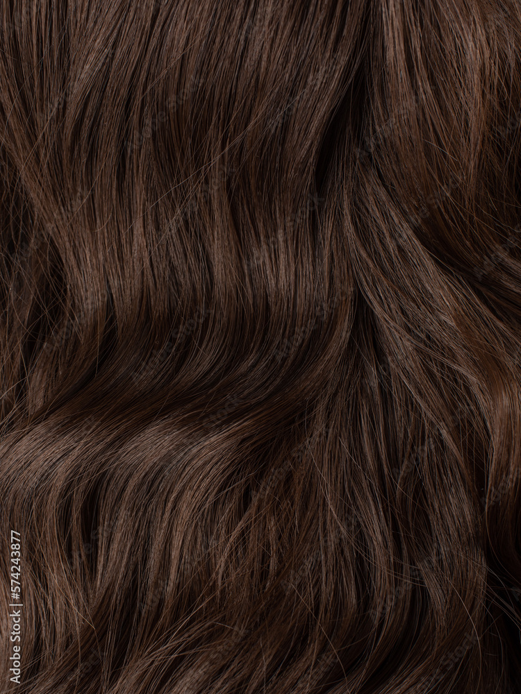 Natural brunette wig close-up. Hair texture. Hair dye, salon care, home coloring. Natural brunette wig close-up. Hair texture. Hair dye, salon care, home coloring.