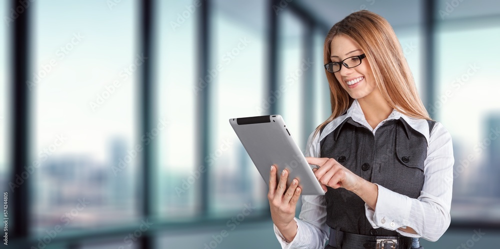Happy young smart business woman with laptop Happy young smart business woman with laptop