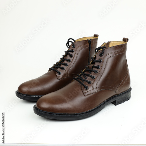 pair of brown leather boots