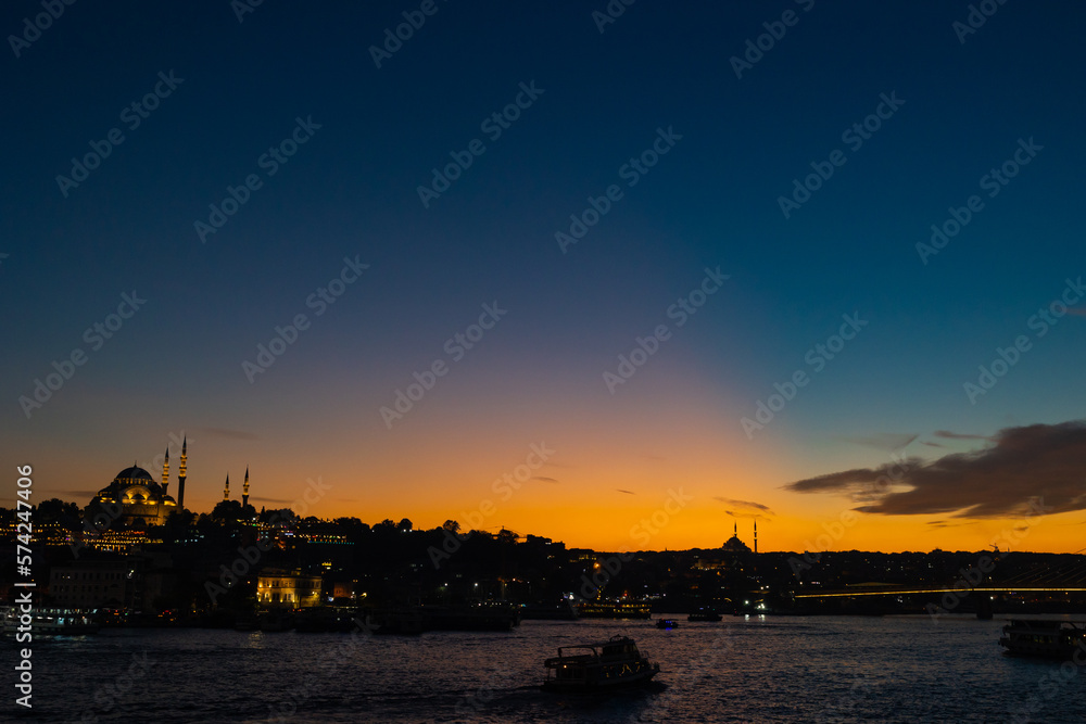Fototapeta premium Istanbul photo. Suleymaniye Mosque and Golden Horn at sunset from Galata Bridge