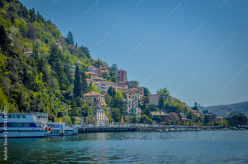 Spring in Italy, Lombardy, Milano, Como lake and city. Landscape view on hills, park, old town and water, with some interesting details, close up and panoramic.