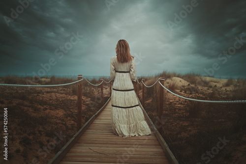 Woman on a wild beach
