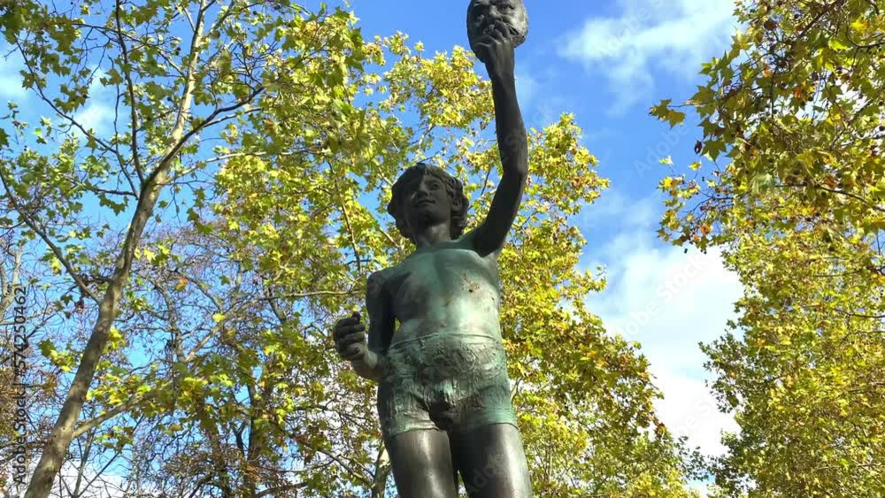 The Mask Seller statue by Zacharie Astruc in the Luxembourg garden in Paris, France The Mask Seller statue by Zacharie Astruc in the Luxembourg garden in Paris, France