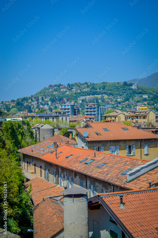 Spring in Italy, Lombardy, Milano, Como lake and city. Landscape view on hills, park, old town and water, with some interesting details, close up and panoramic.