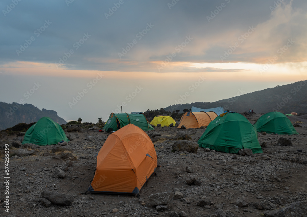 Camping in the Clouds - Tents on a Mountain Peak at Sunset