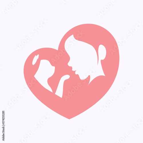 Woman holding a cat with her arm in heart shaped silhouette 