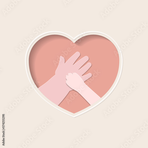 Small paw of cat on hand of kid, in pink heart shaped frame paper art 