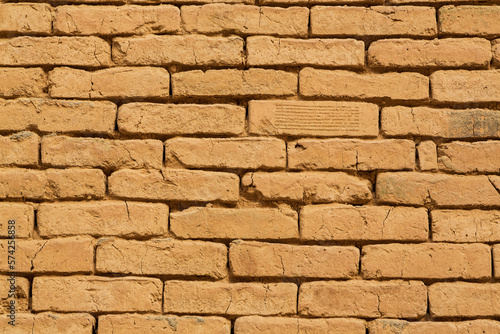 Babylon, Iraq - November 2022: Signature and writings on brick walls of ancient Mesopotamia in Babylon