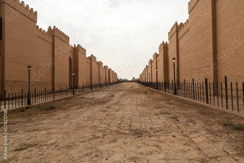 Babylon great walls restored by Saddam Houssein and ancient Mesopotamian Street. Babylon, Iraq