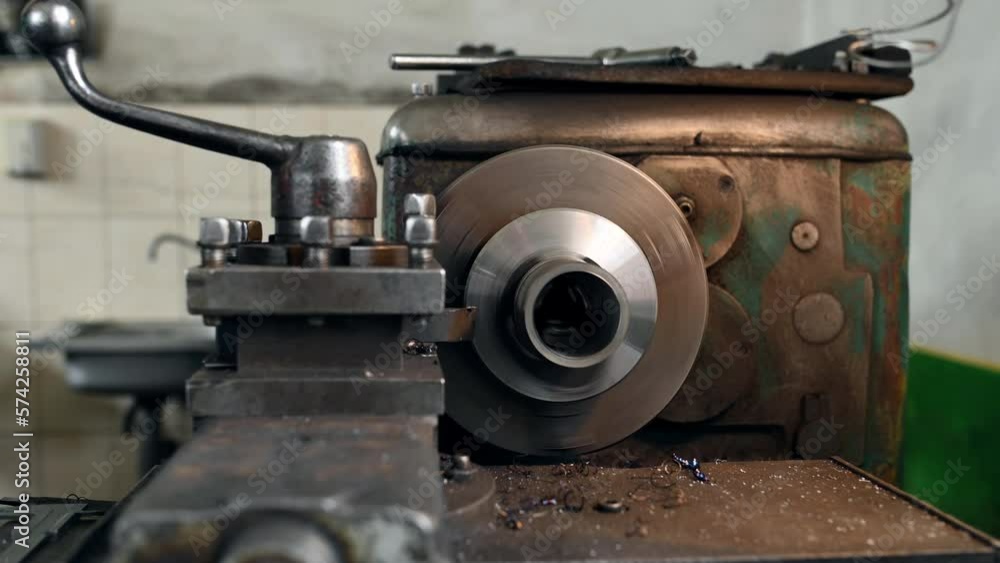 The machine cutting metal part on the factory. The machine cutting metal part on the factory.